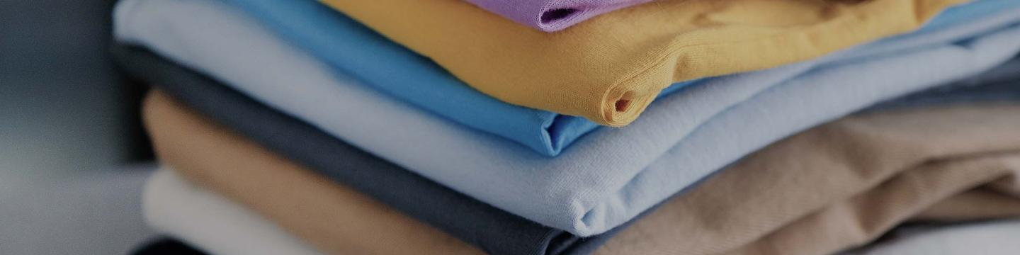 Stack of coloured t-shirts