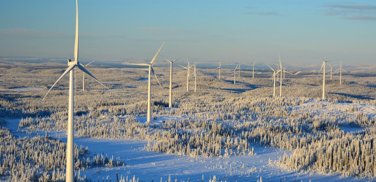 BJORKHOJDEN, SWEDEN - NOV 20, 2015: Bjorkhojden Wind Farm from height in the winter Swedish forest