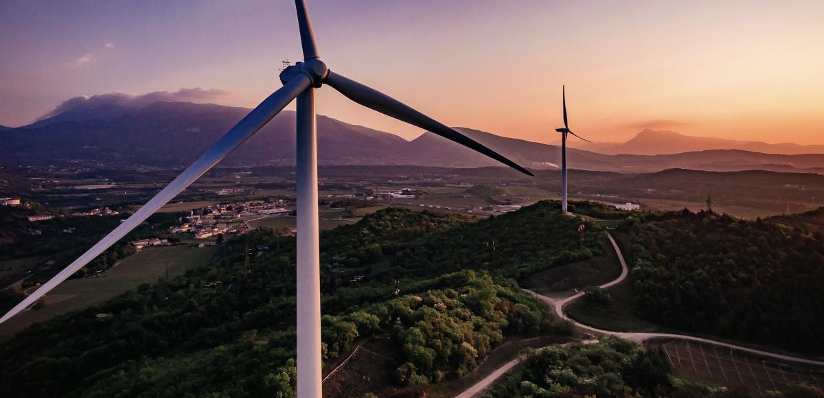 Wind turbines on the Italian hills at sunrise