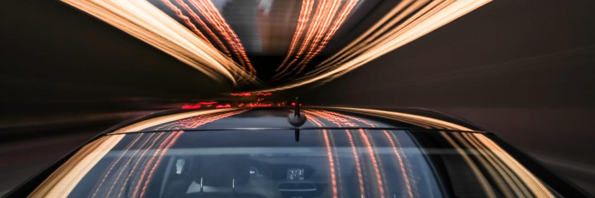 Long exposure on car in motion at dusk