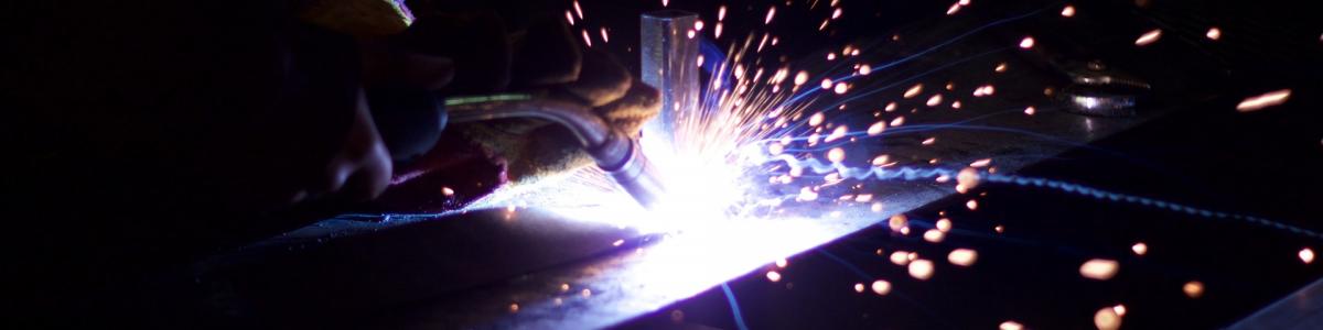 person welding  materials quality engineering