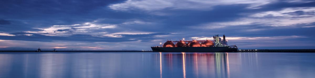 LNG tanker - sunrise over the sea gas terminal