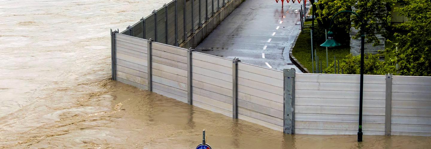 Flood protection system along street in Austria holding back floodwaters