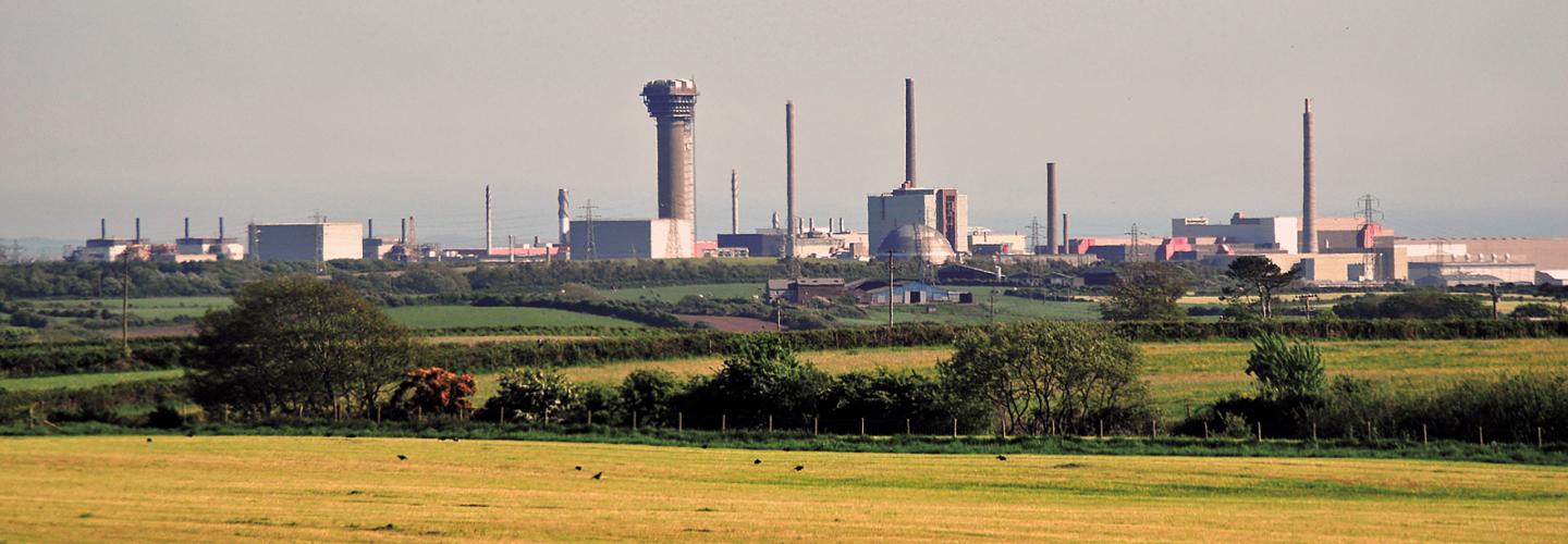View across open fields of the Sellafield nuclear facility