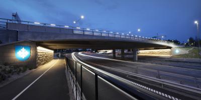 Motorway ramp and a bridge in the evening