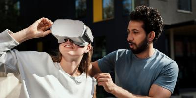 Man and woman trying VR set