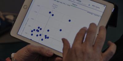 Hand over the tablet with analytics