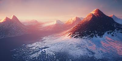 Mountains covered with snow at sunset