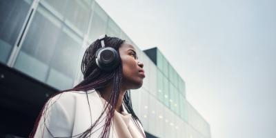 Woman with headphone making future