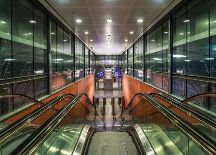 Escalator to the platform area of a railway station
