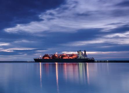 LNG tanker - sunrise over the sea gas terminal