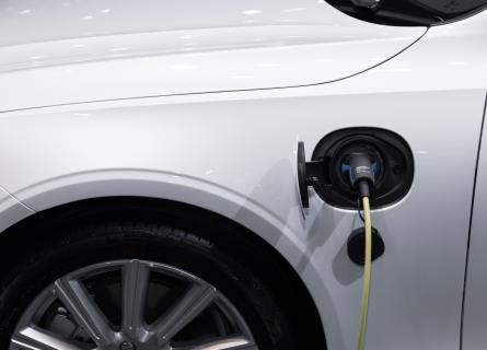 white electric vehicle charging