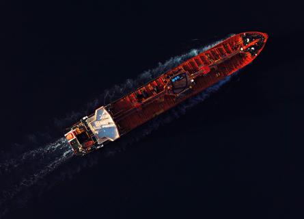 Red tanker in the navy ocean