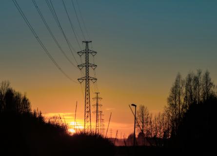 High voltage towers against the beautiful sunset