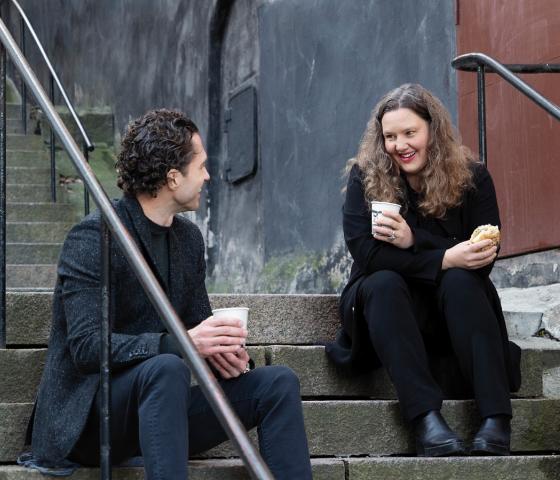 Man and woman drinking coffee together 