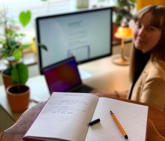 Maja Linderholm writing her Master thesis on her computer