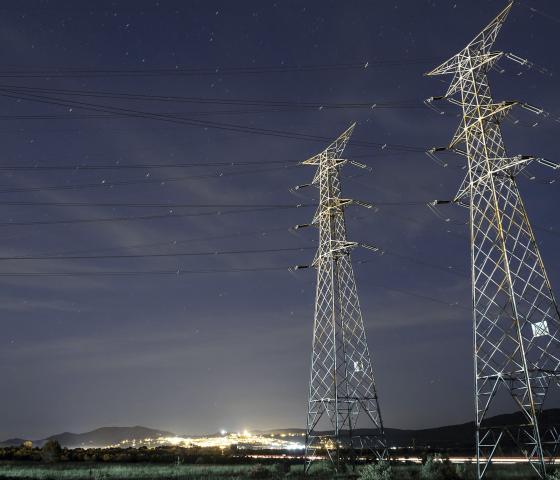 Power lines in night sky