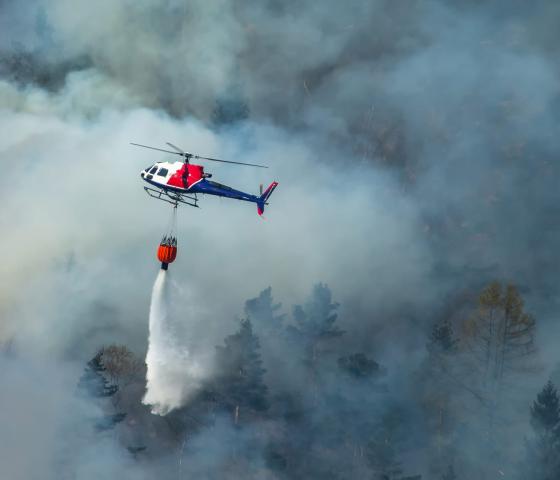 Helicopter extinguishing wildfire in norway