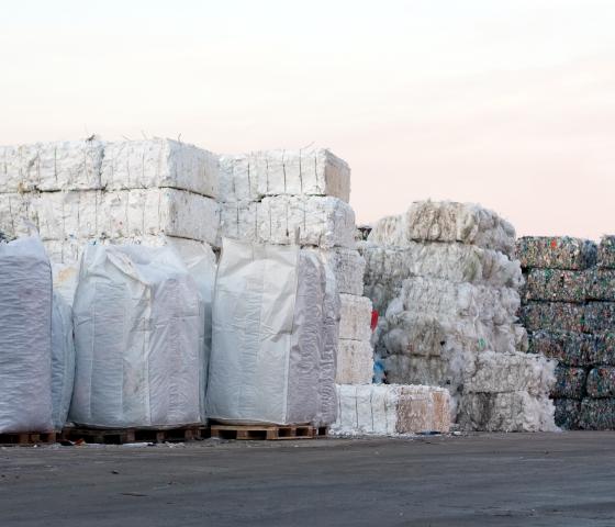 recycled plastics packed in piles