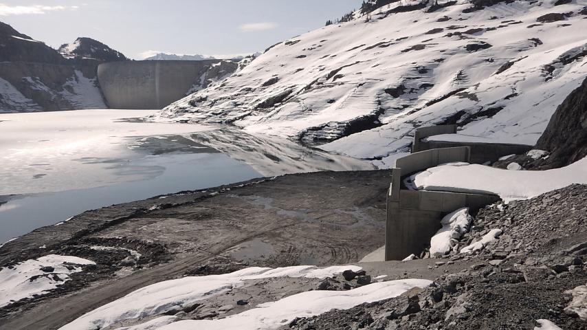 Intakes and dam exposed at low water level in Lake Emosson